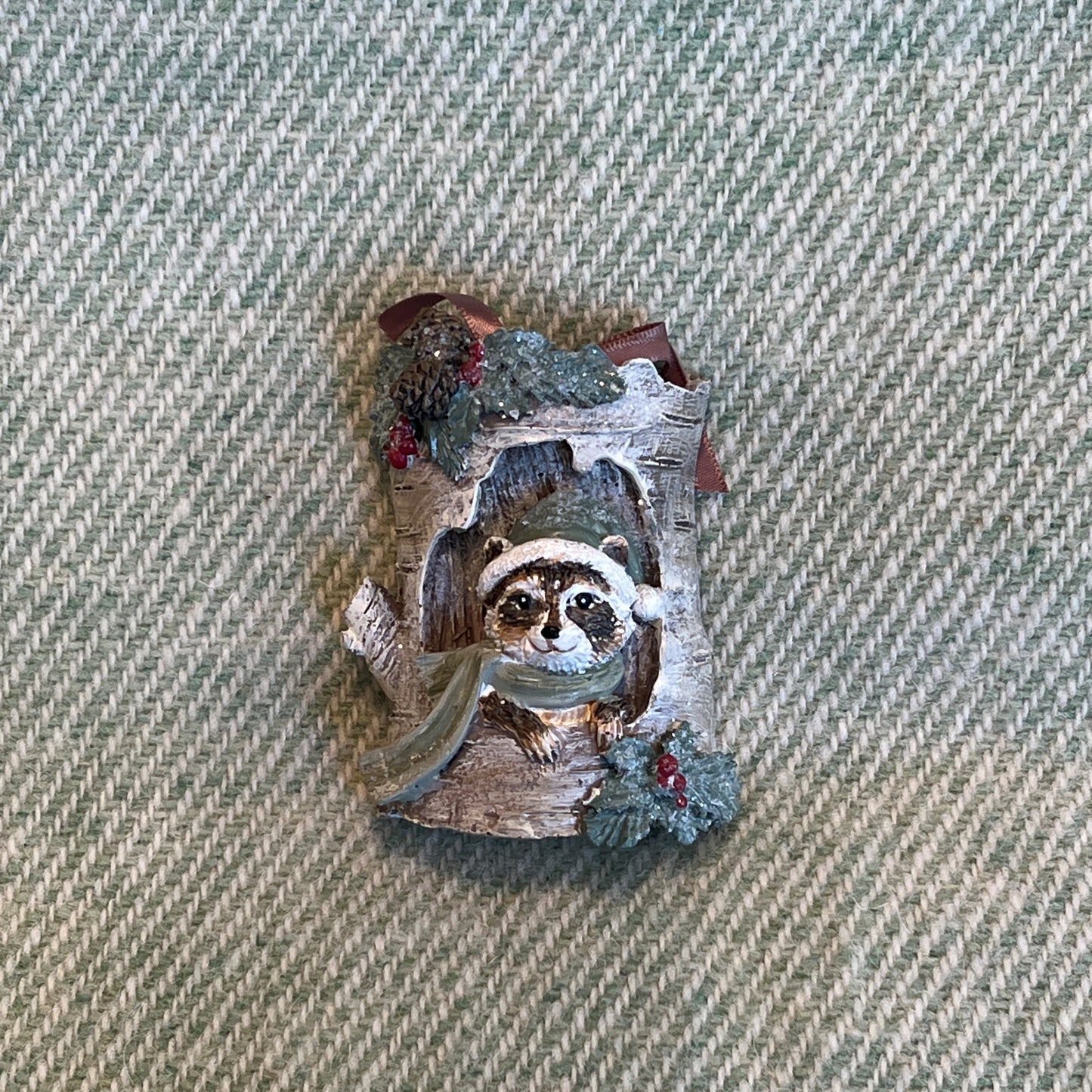 Raccoon In Tree Trunk Ornament