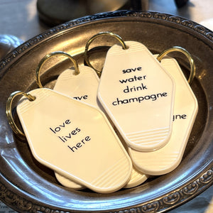 Save Water Drink Champagne Hotel Key