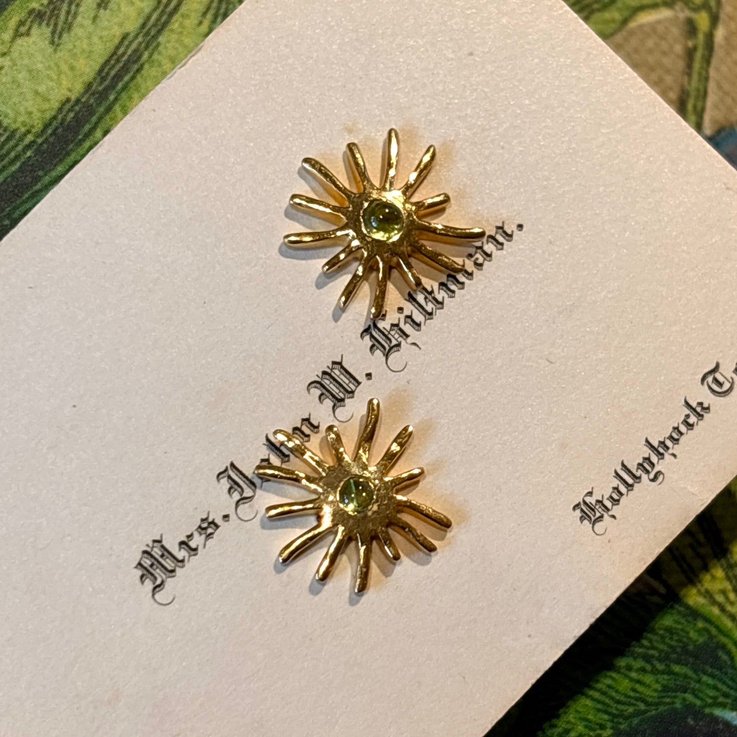 Gold Sunburst With Peridot Stud Earrings