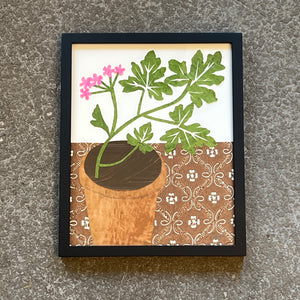 Scented Geranium on Brown Patterned Tablecloth by Denise Fiedler